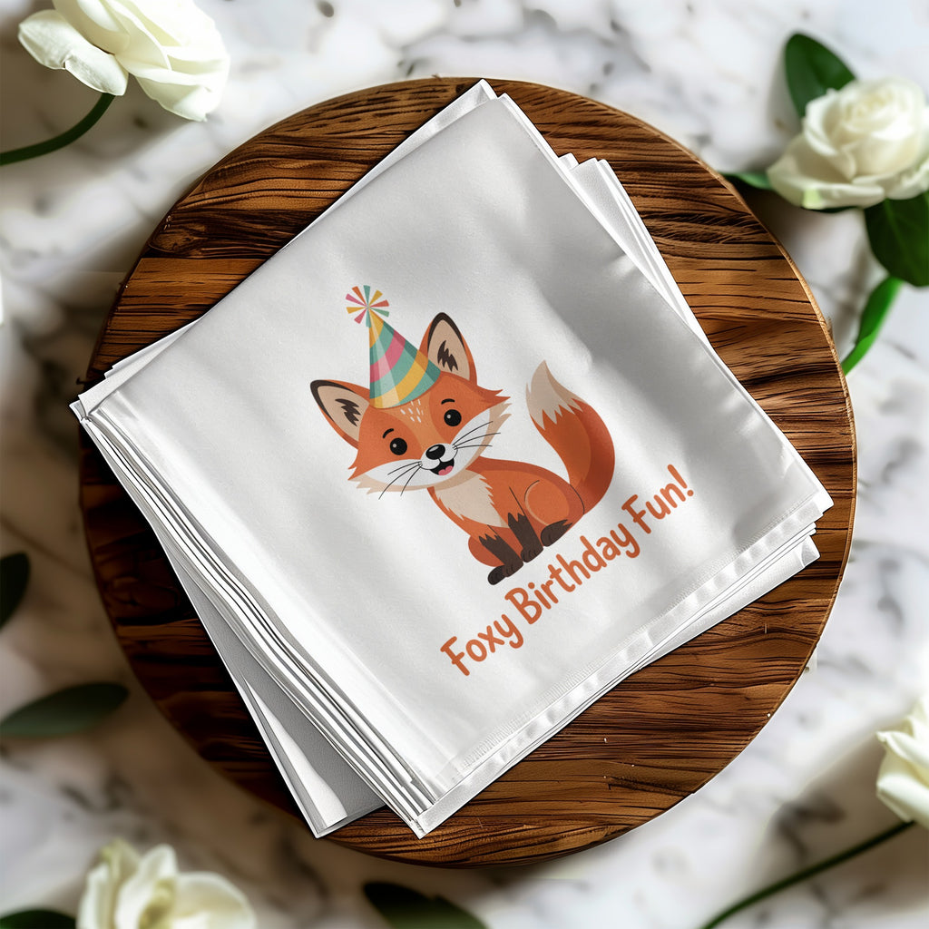 White napkin with a cartoon fox wearing a party hat and "Foxy Birthday Fun!" text.