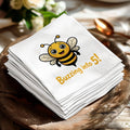 White napkin with cartoon bee and "Buzzing into 5!" text.