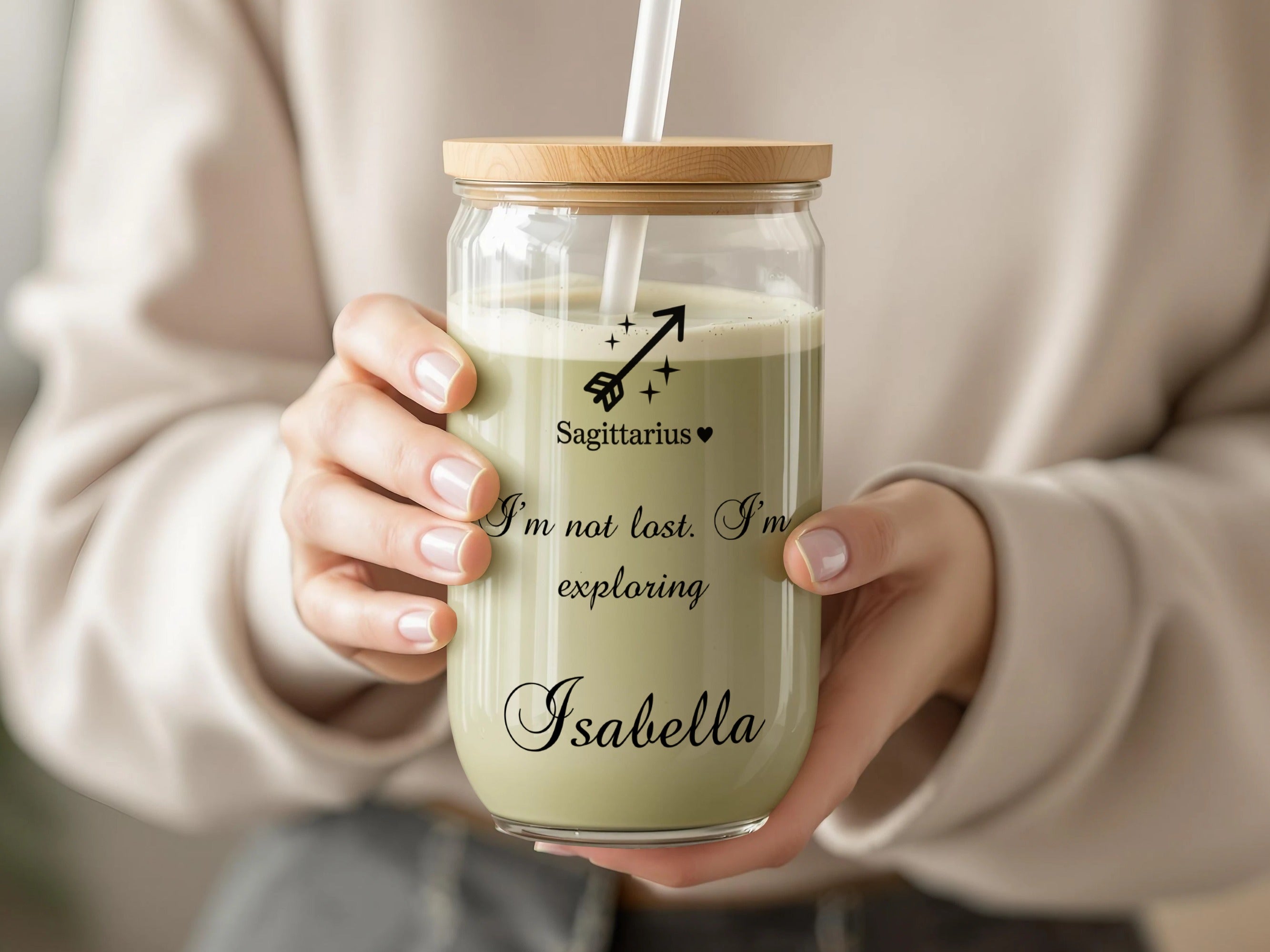 Glass can-shaped tumbler with "Sagittarius, I'm not lost. I'm exploring." text.