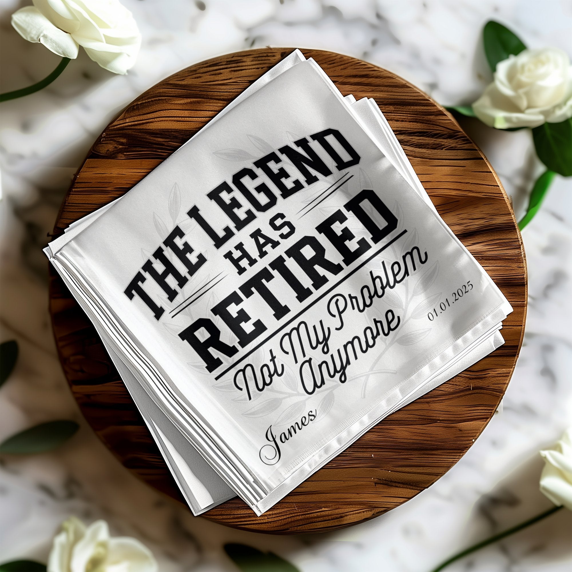 White handkerchief with "THE LEGEND HAS RETIRED Not My Problem Anymore" and "James" text.