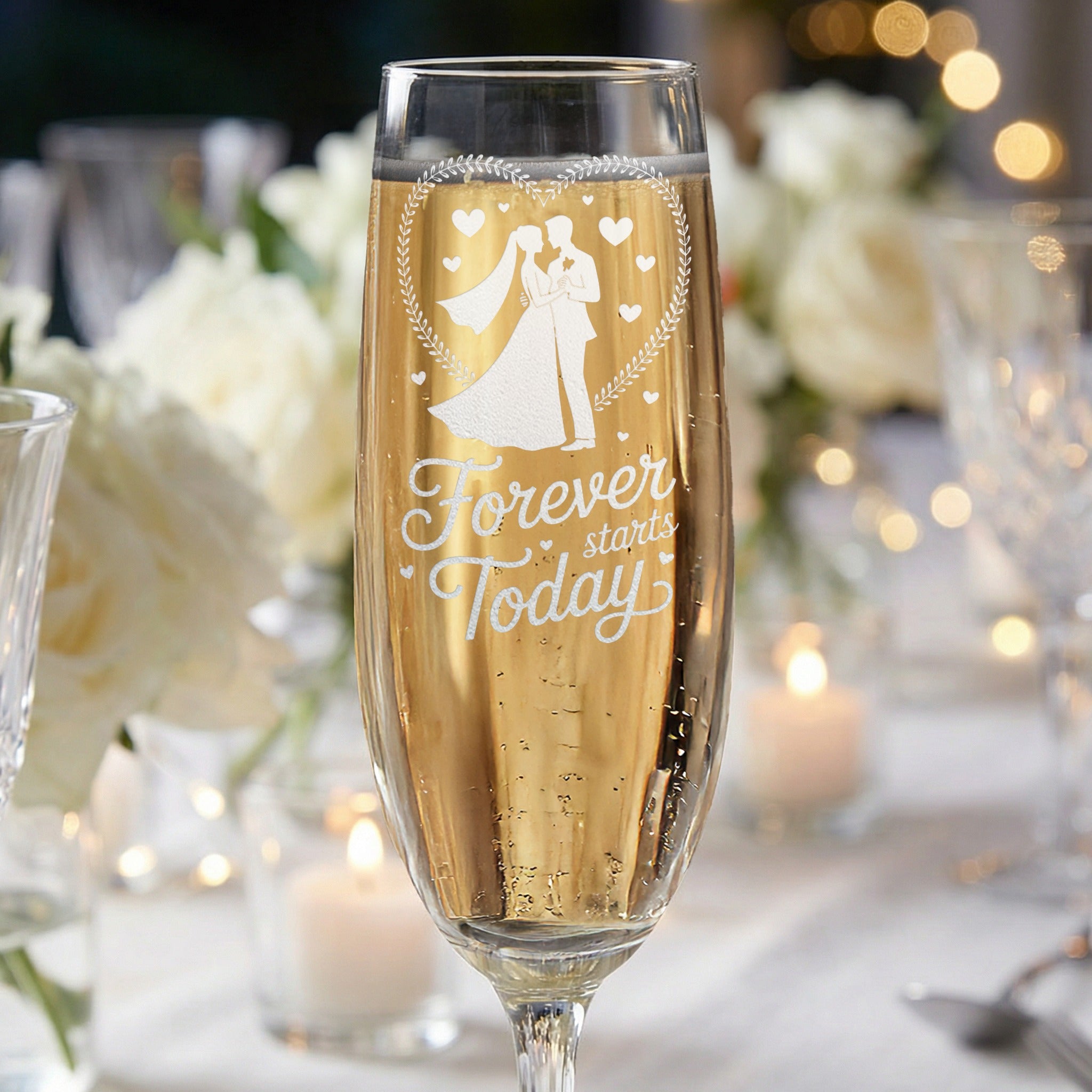 Champagne flute with etched wedding couple silhouette and "Forever starts Today" text.
