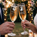 Two champagne flutes clinking, etched with "Mr & Mrs Rodriguez" and "Forever starts today."