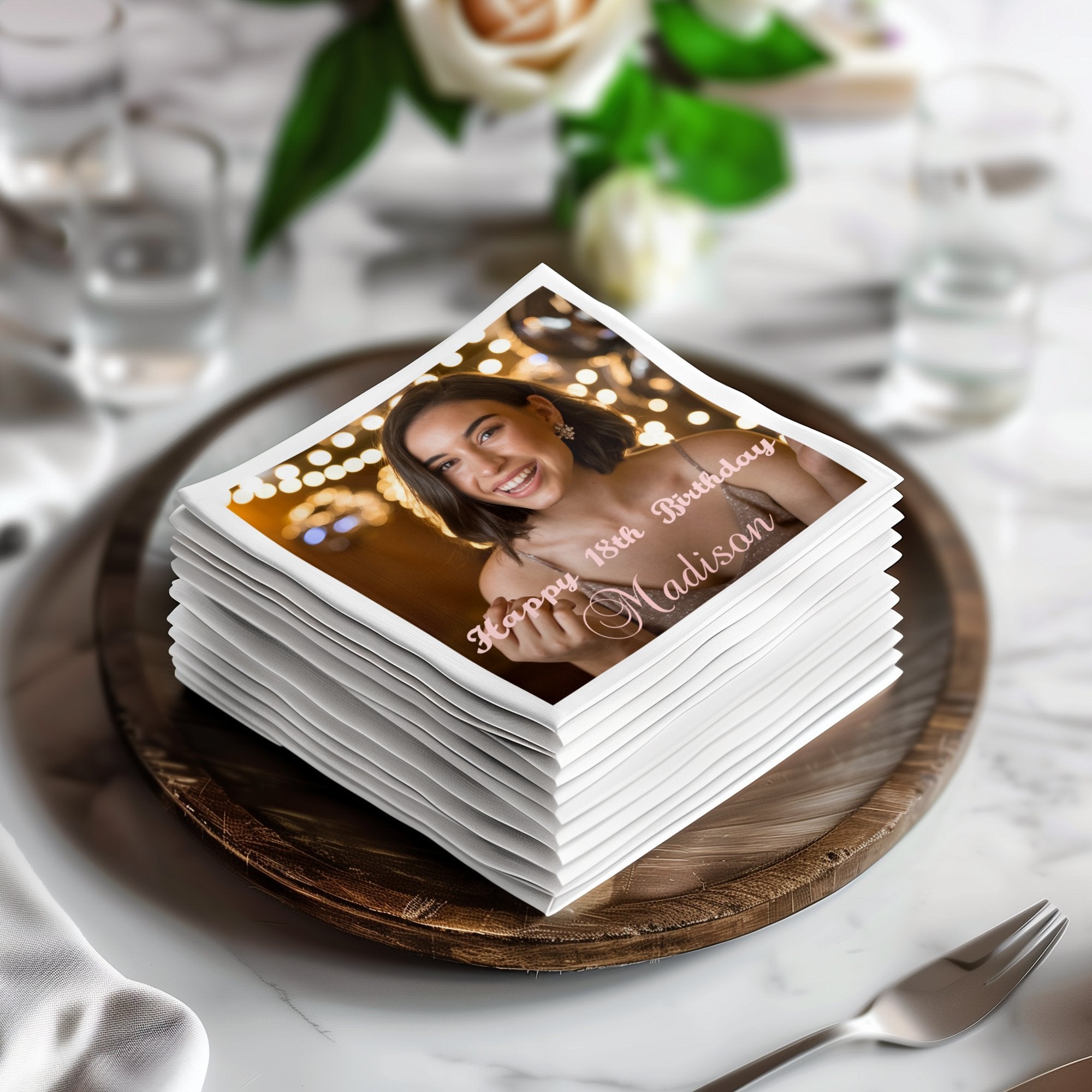 Stack of square napkins with "Happy 18th Birthday Madison" text and photo.