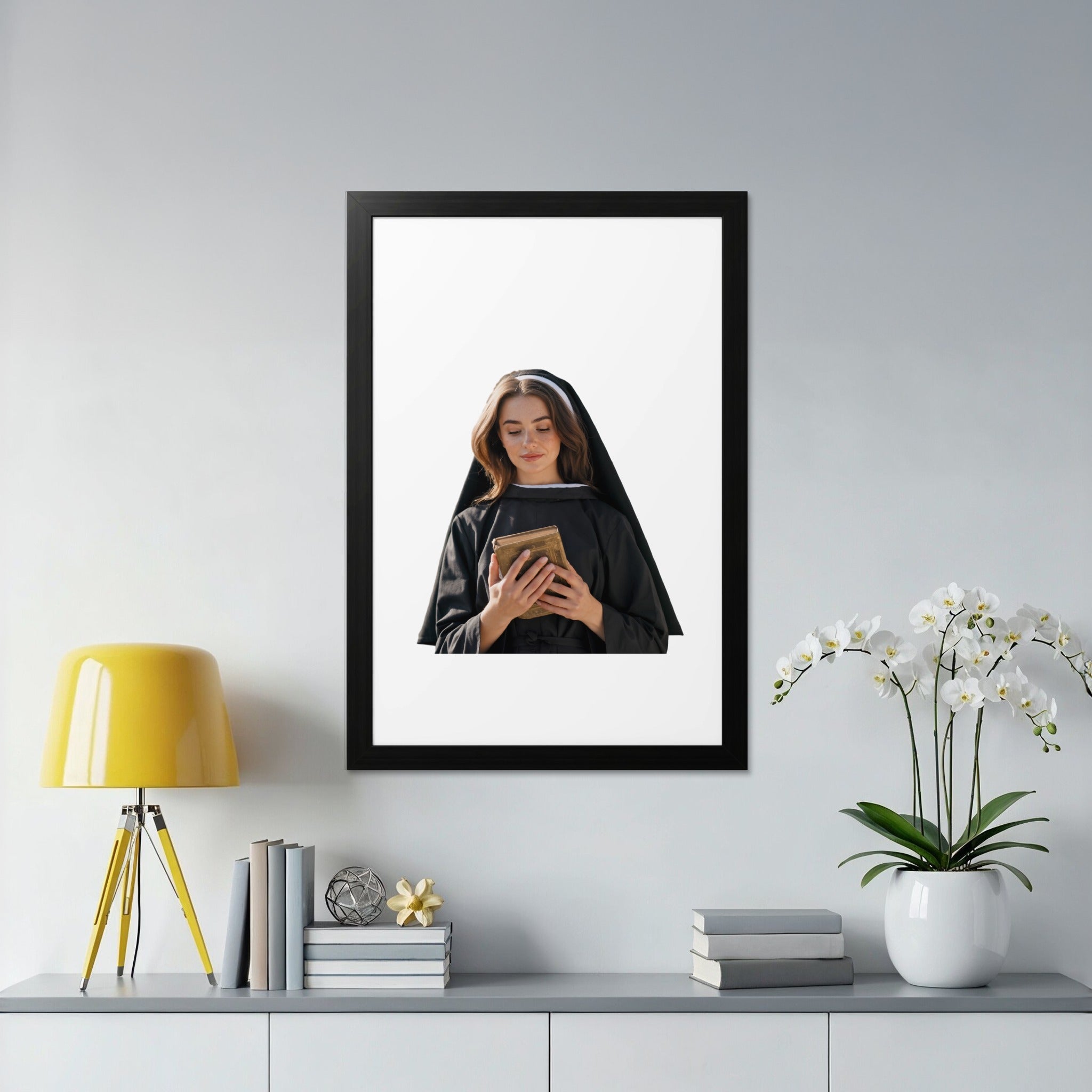 Nun in black habit holding a book.