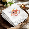 Napkins with a cartoon fish and "Swimming into 8!" text.
