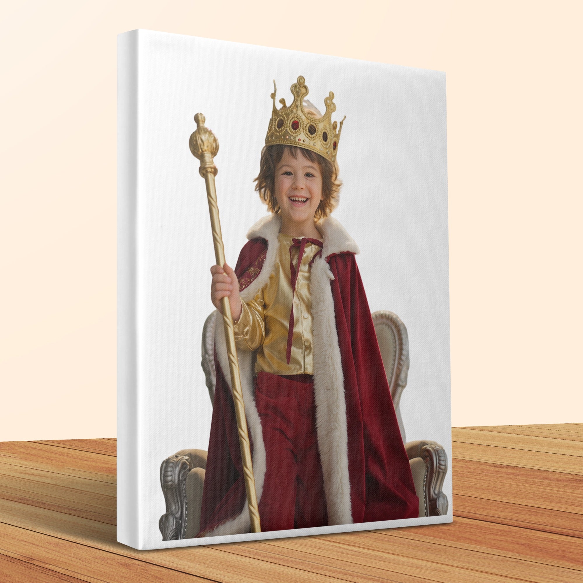 Child wearing a crown and royal robe sits on a chair holding a scepter.
