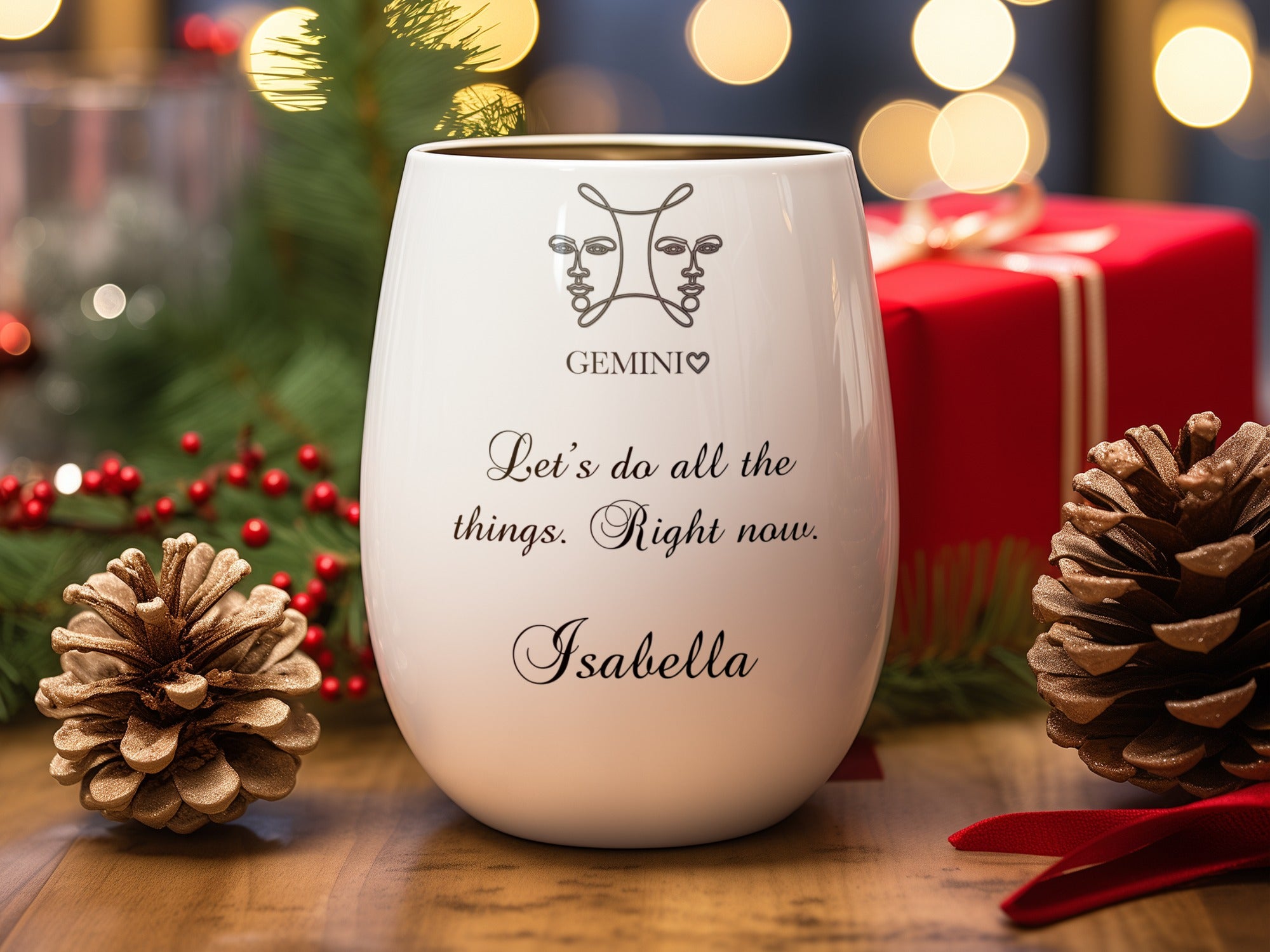 White wine glass with Gemini constellation, quote, and name "Isabella".