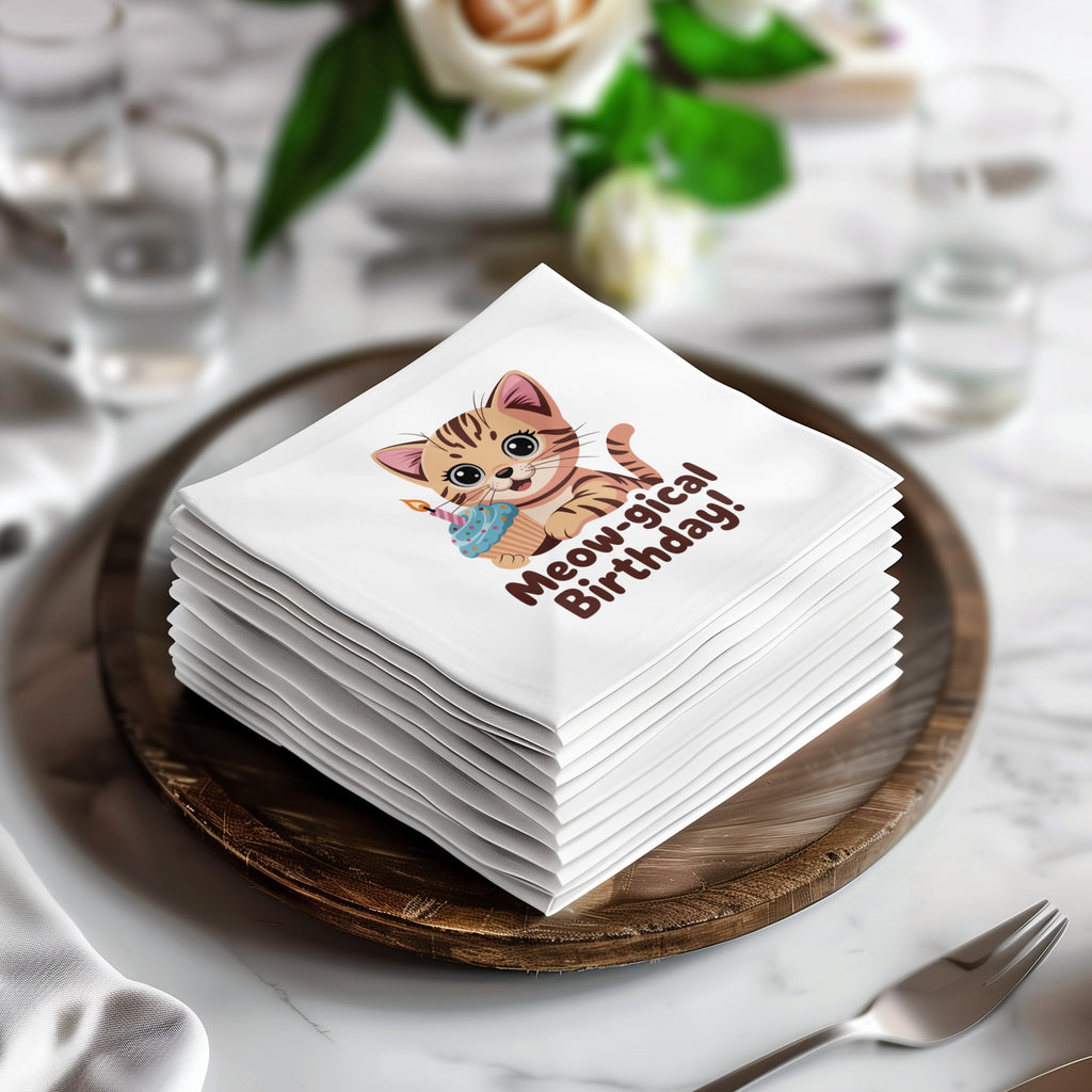 Stack of white napkins featuring a cartoon cat with "Meow-gical Birthday!" text.