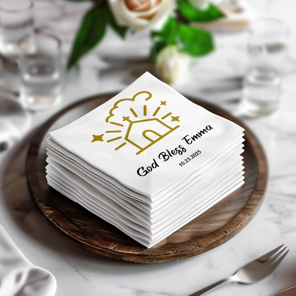 Stack of white napkins with "God Bless Emma 10.23.2025" and a house icon.