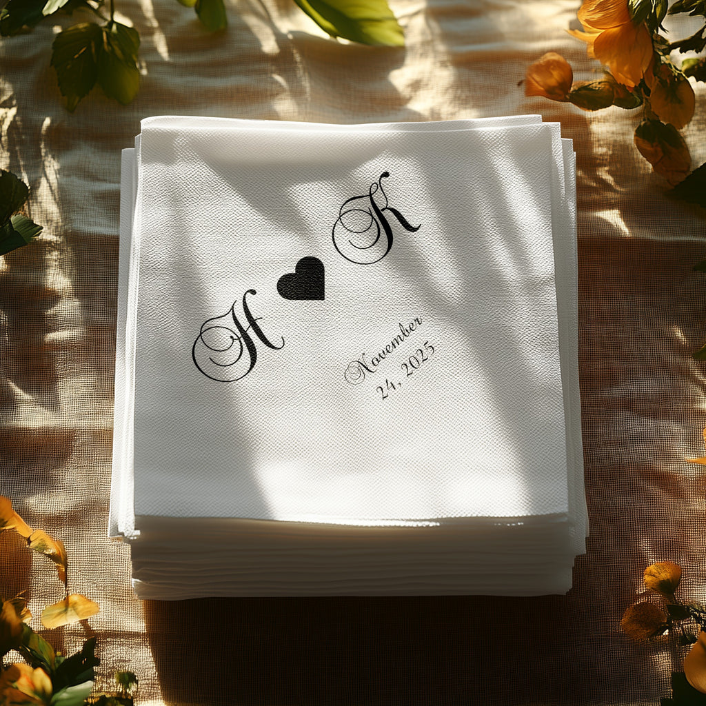 Stack of white napkins with black "H & K" monogram and "November 24, 2025".