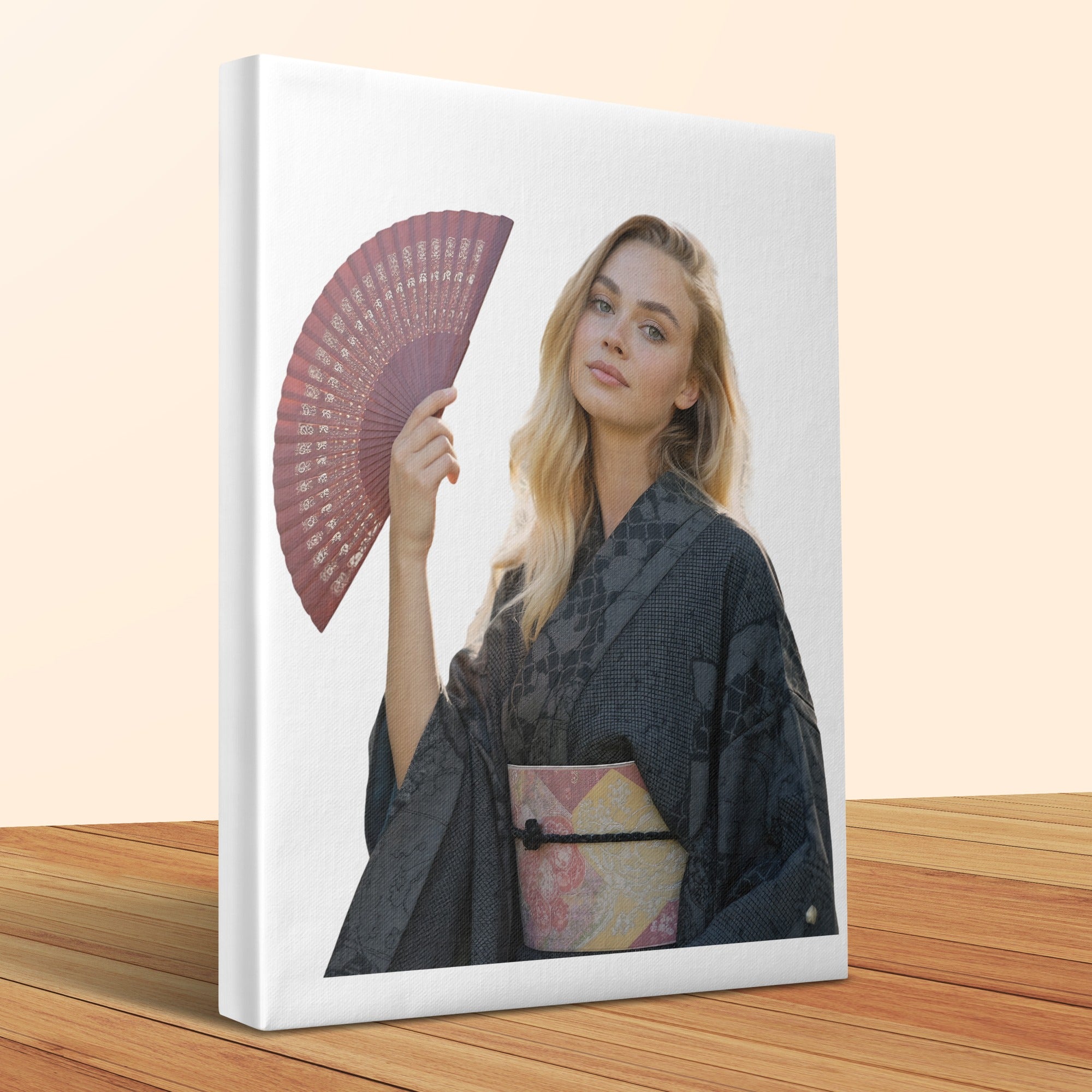 Woman in traditional Japanese kimono holding a red fan.