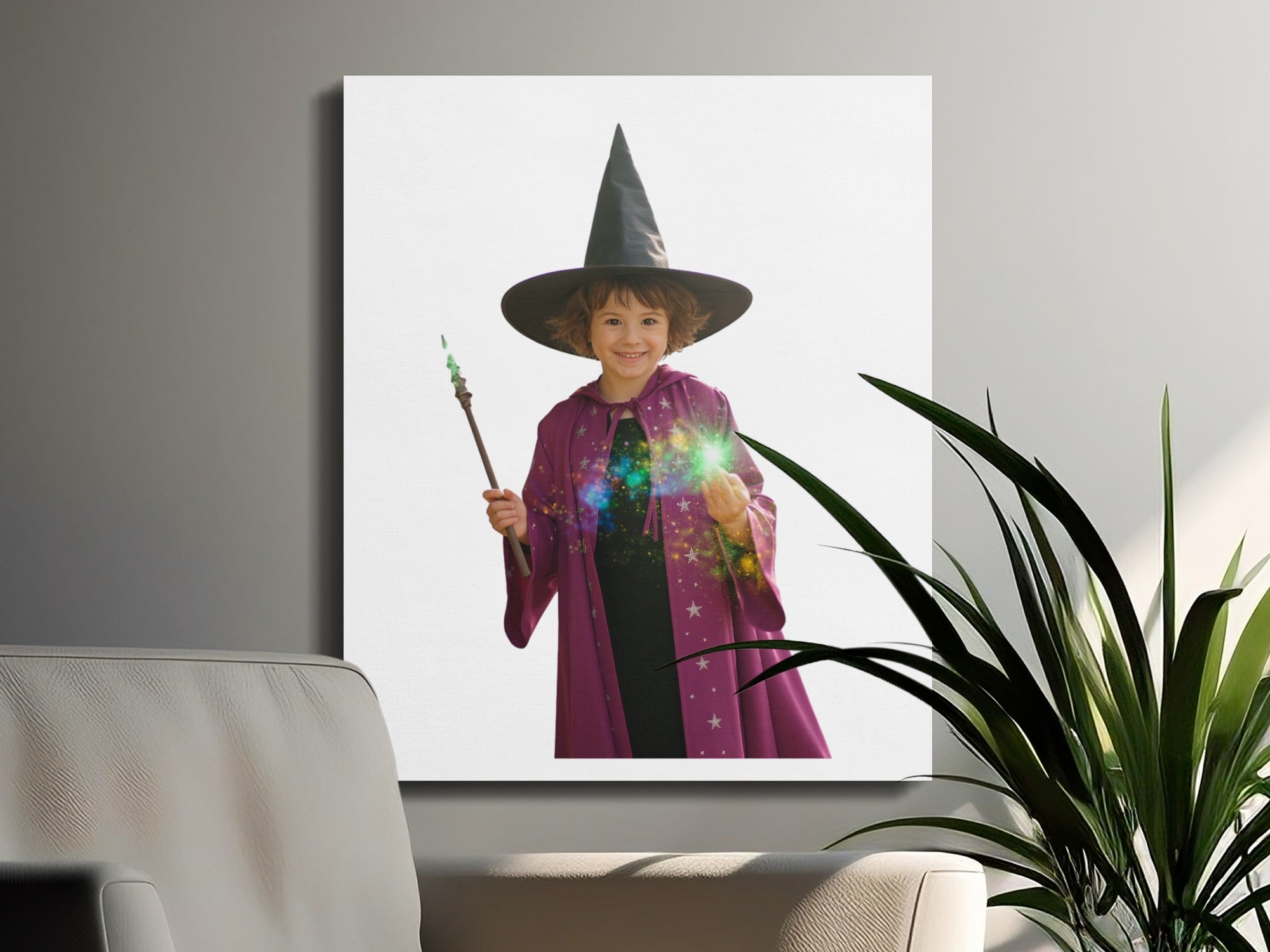 Child in witch hat and purple robe holding a magic wand.