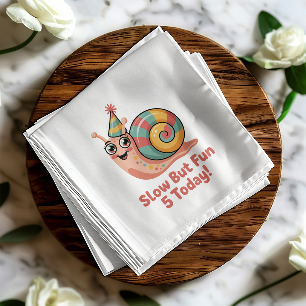 White napkin with a smiling snail wearing a party hat, saying "Slow But Fun 5 Today!".