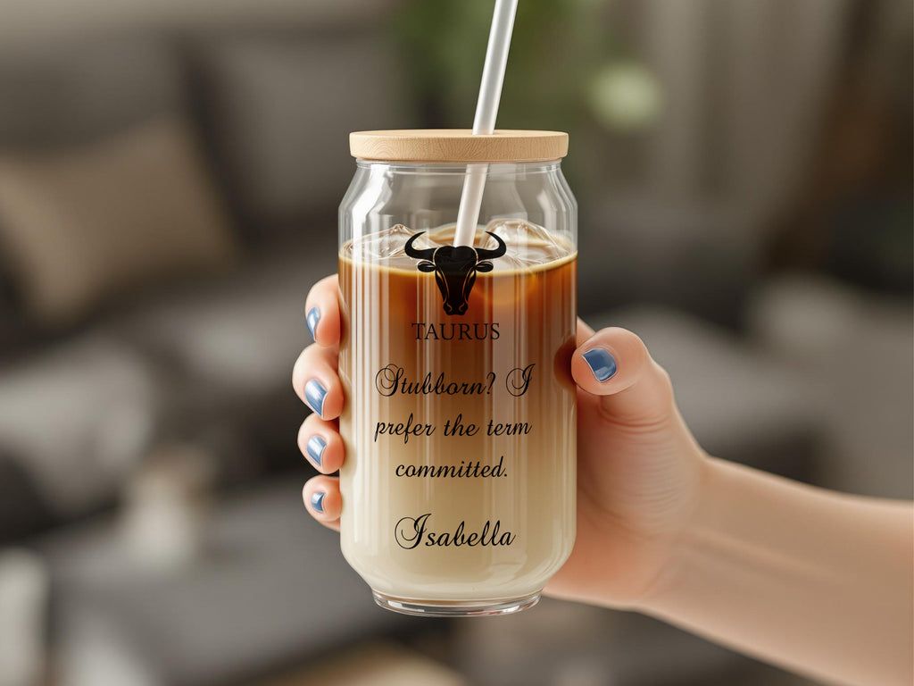 Glass tumbler with "TAURUS Stubborn? I prefer the term committed. Isabella" text.