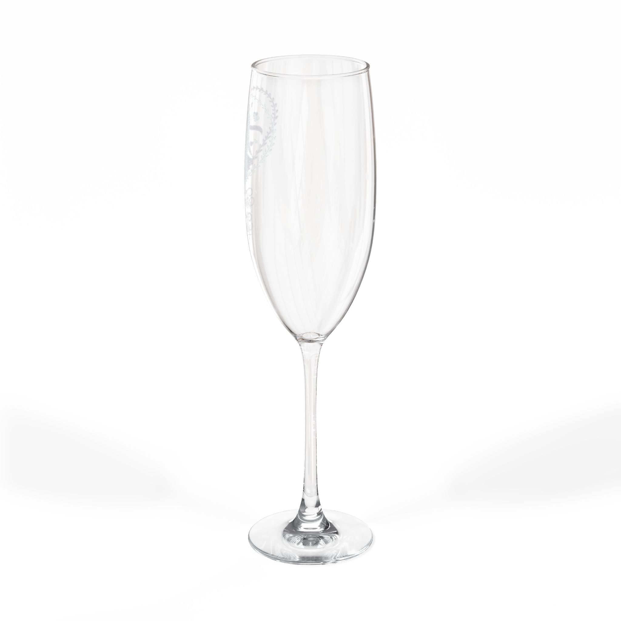 Clear champagne flute with a delicate etched design on the bowl.