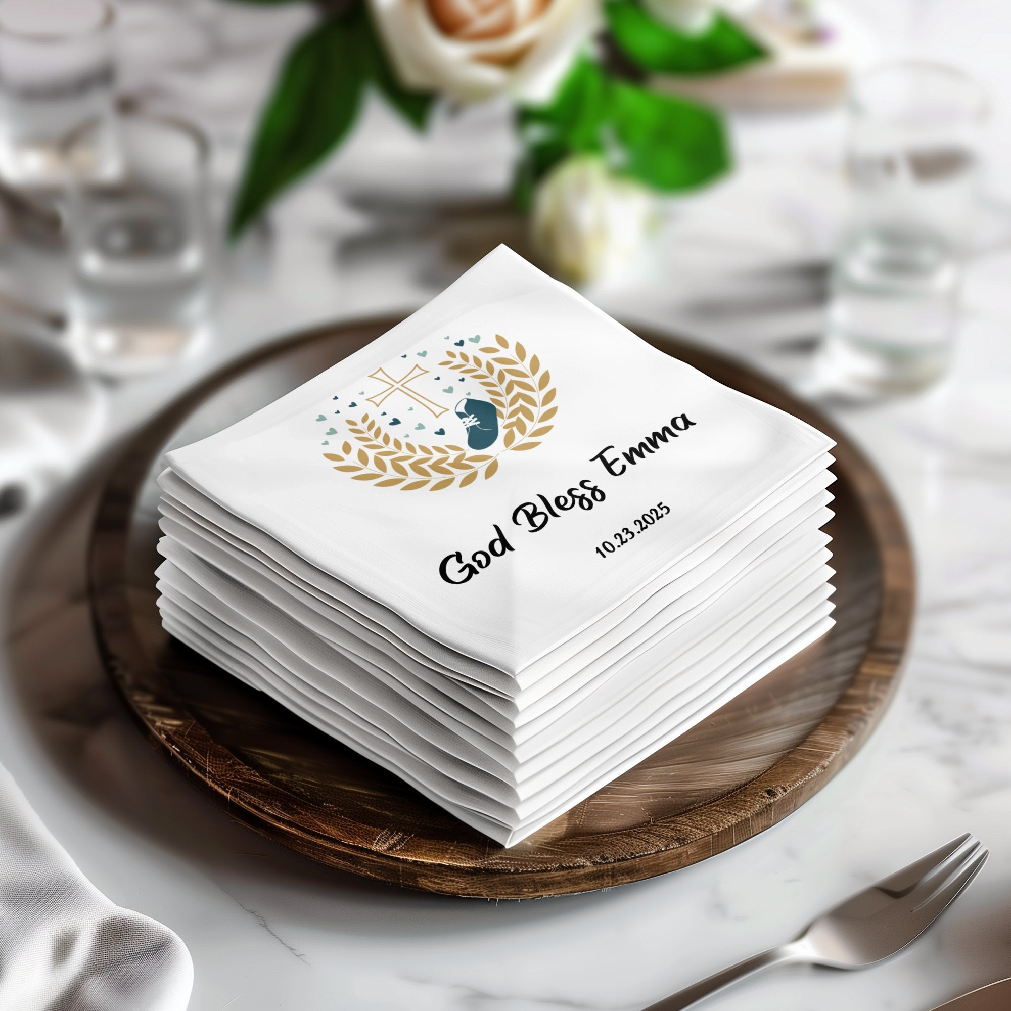 Stack of white napkins with "God Bless Emma" and 10.23.2025.