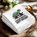 White napkin with turtle on skateboard and text "SLOW AND RECKLESS... HAPPY BIRTHDAY".