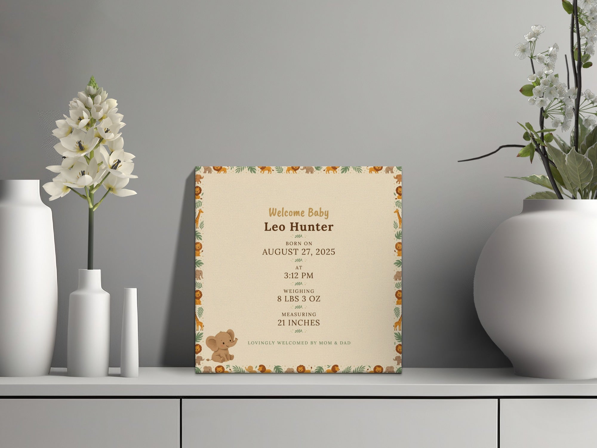 Baby's birth announcement for Leo Hunter, born August 27, 2025, with animal border.