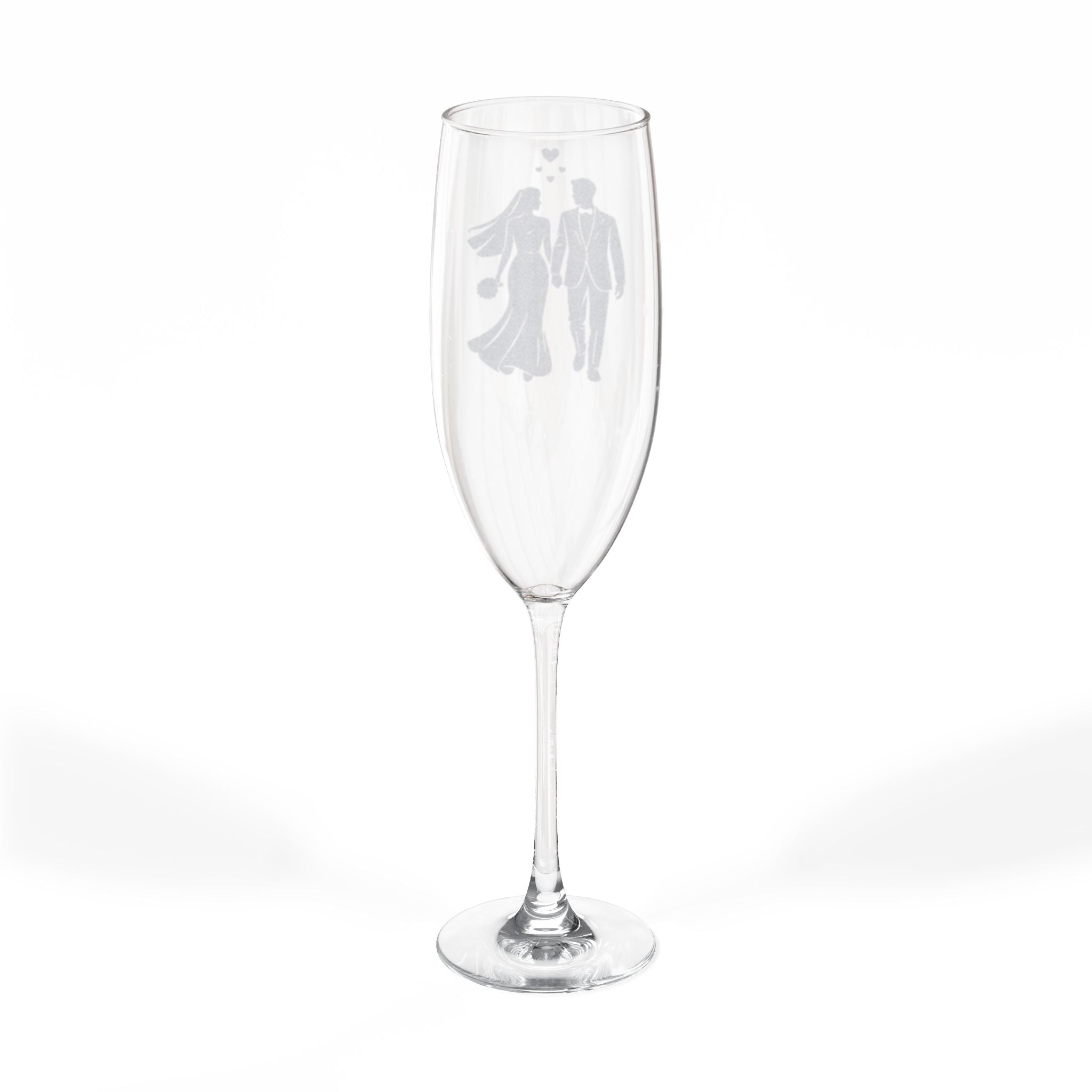 Champagne flute with etched bride and groom silhouettes.