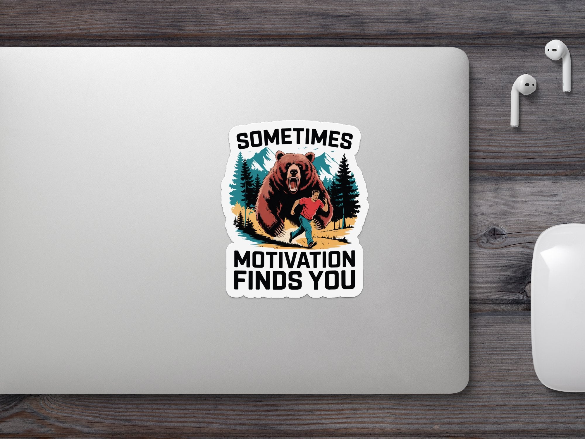 Sticker: Man running from a bear with text "SOMETIMES MOTIVATION FINDS YOU".