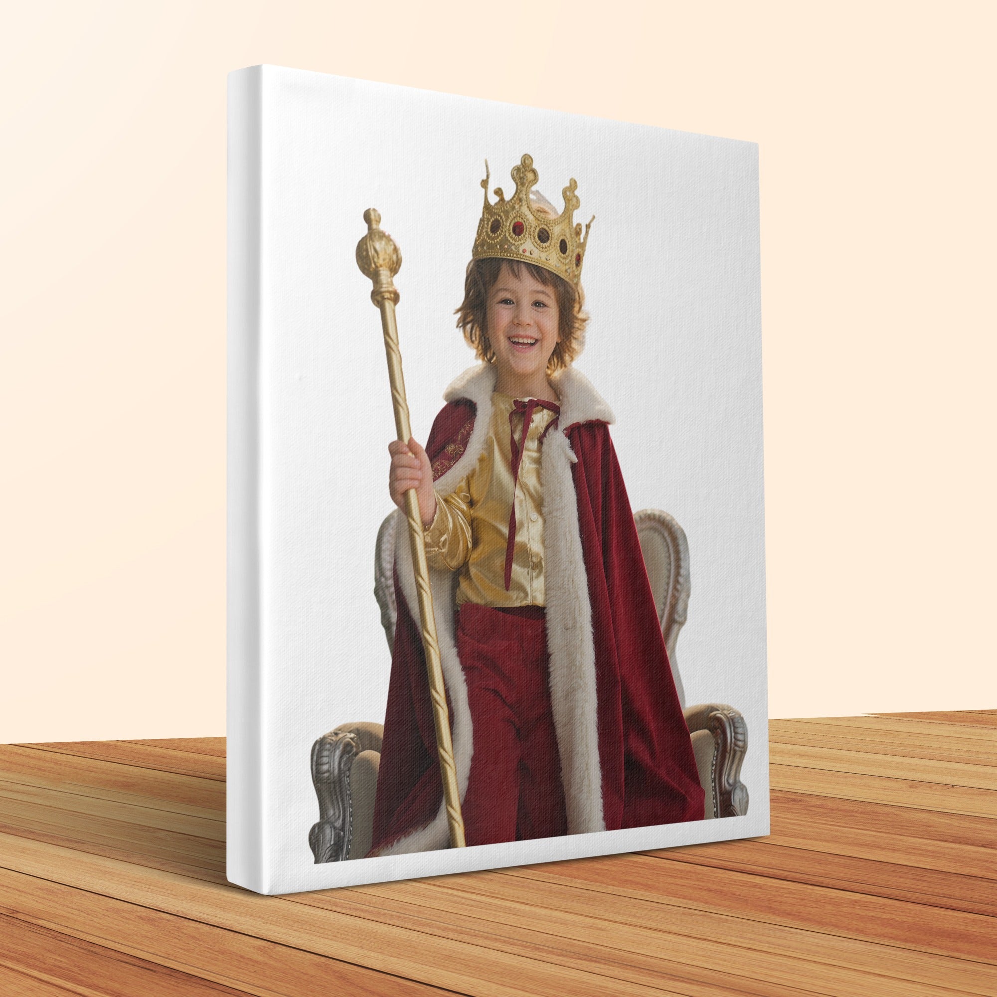 Child in a king's costume with crown and scepter sits on a throne.