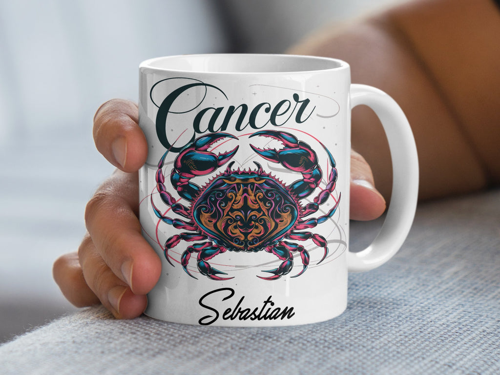 White mug with Cancer zodiac symbol and "Sebastian" text.