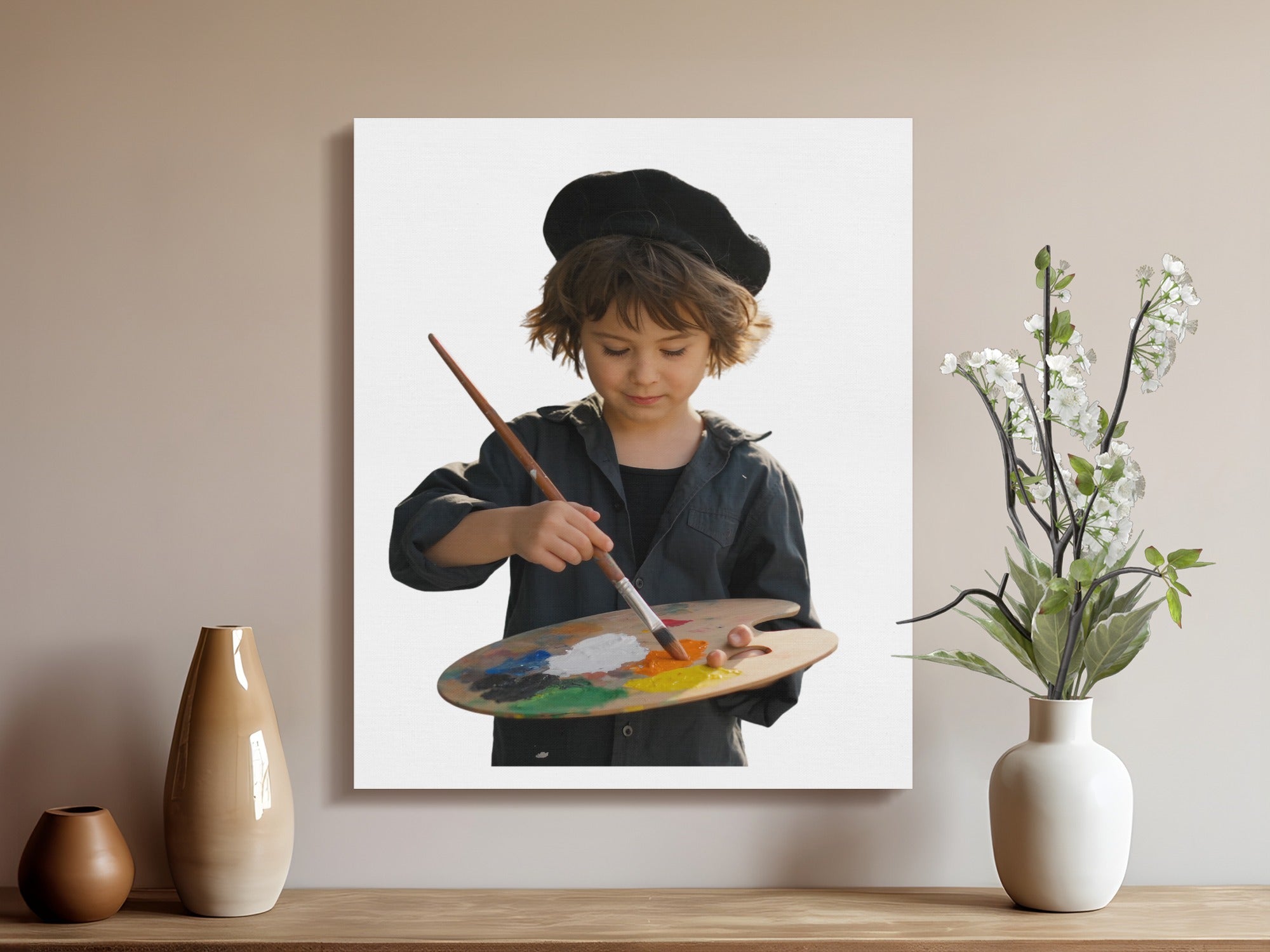 Child wearing black beret and smock holds palette and paintbrush.
