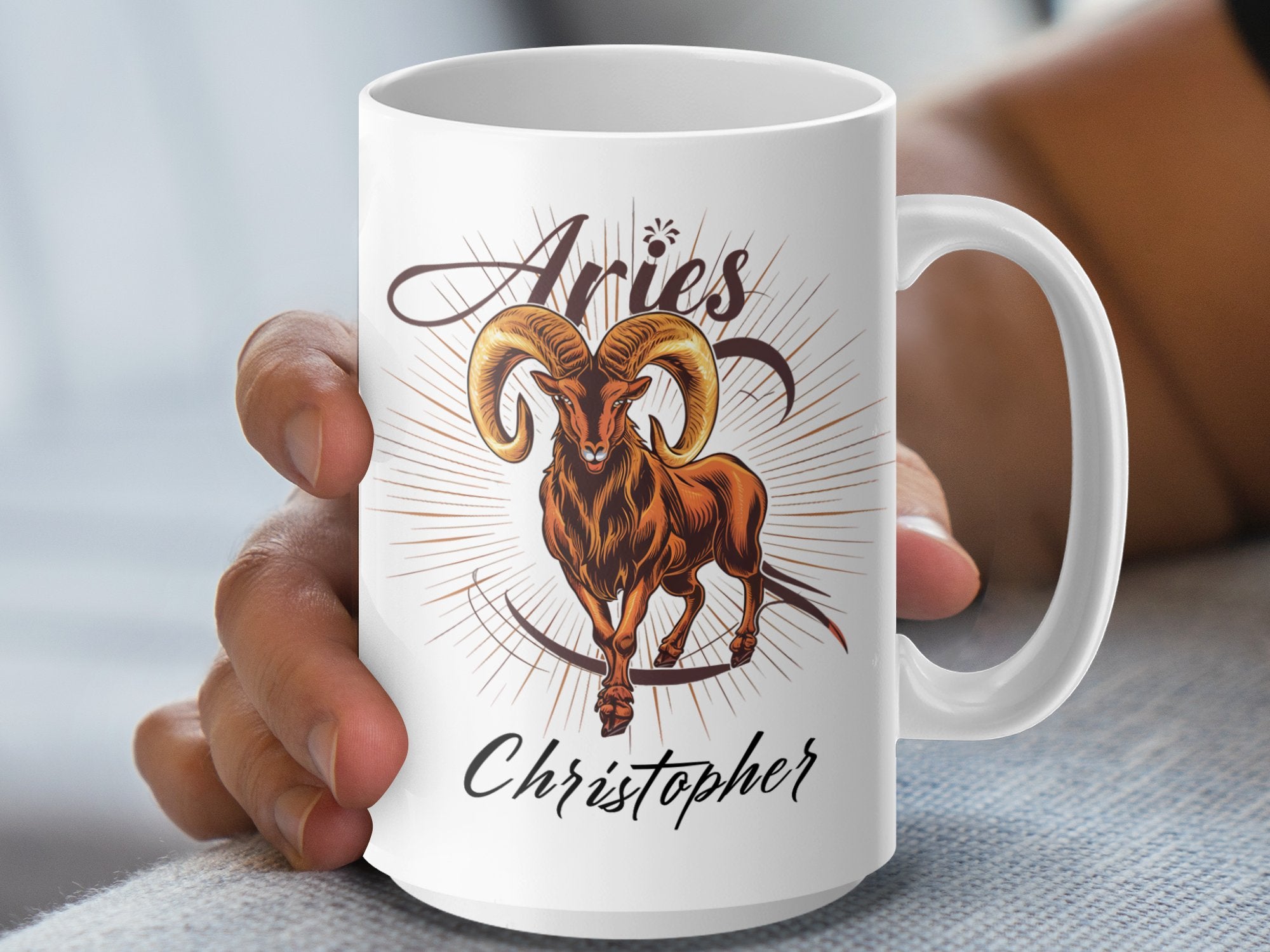 White mug with Aries ram illustration and "Christopher" in script.
