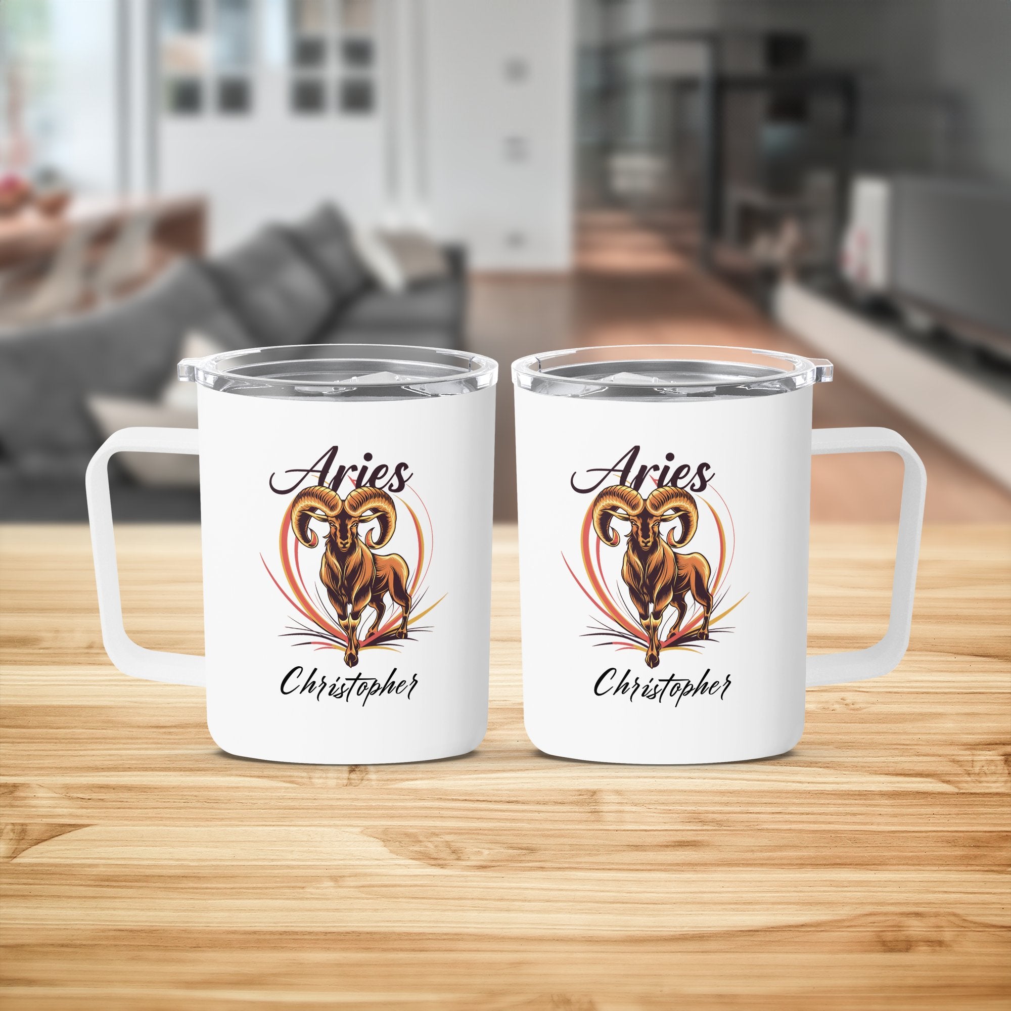 Two white Aries zodiac mugs with ram illustration and personalized name.