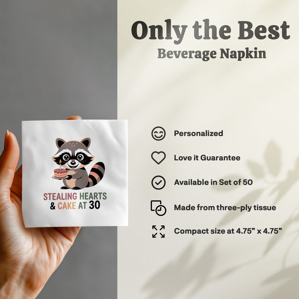 Beverage napkin with raccoon holding cake and "Stealing Hearts & Cake At 30" text.