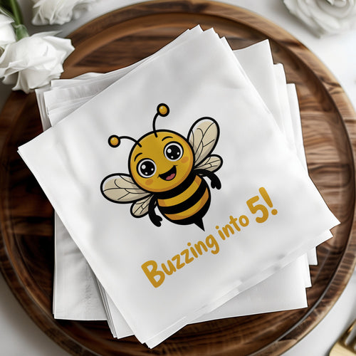 White napkin with cartoon bee and "Buzzing into 5!" text.