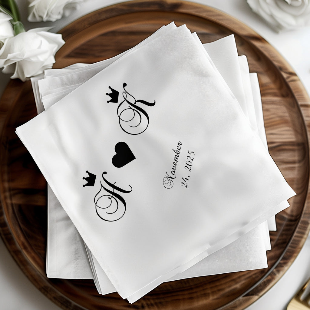 White napkins with black monogram "A K" and date "November 24, 2025".