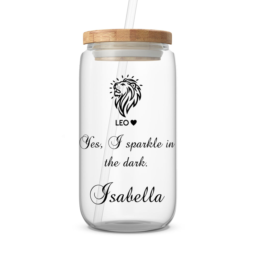 Clear glass tumbler with Leo zodiac sign and "Yes, I sparkle in the dark. Isabella."