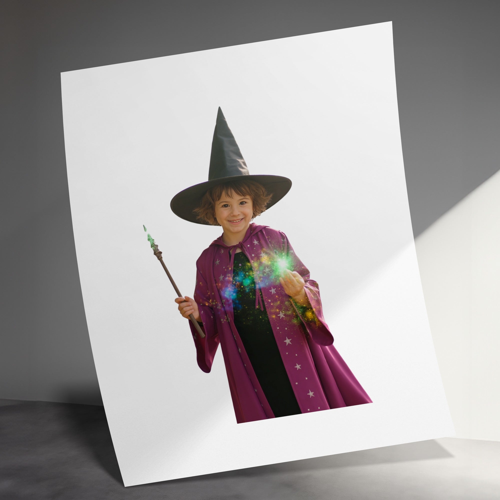 Child in witch costume with magic wand, casting sparkly spell.