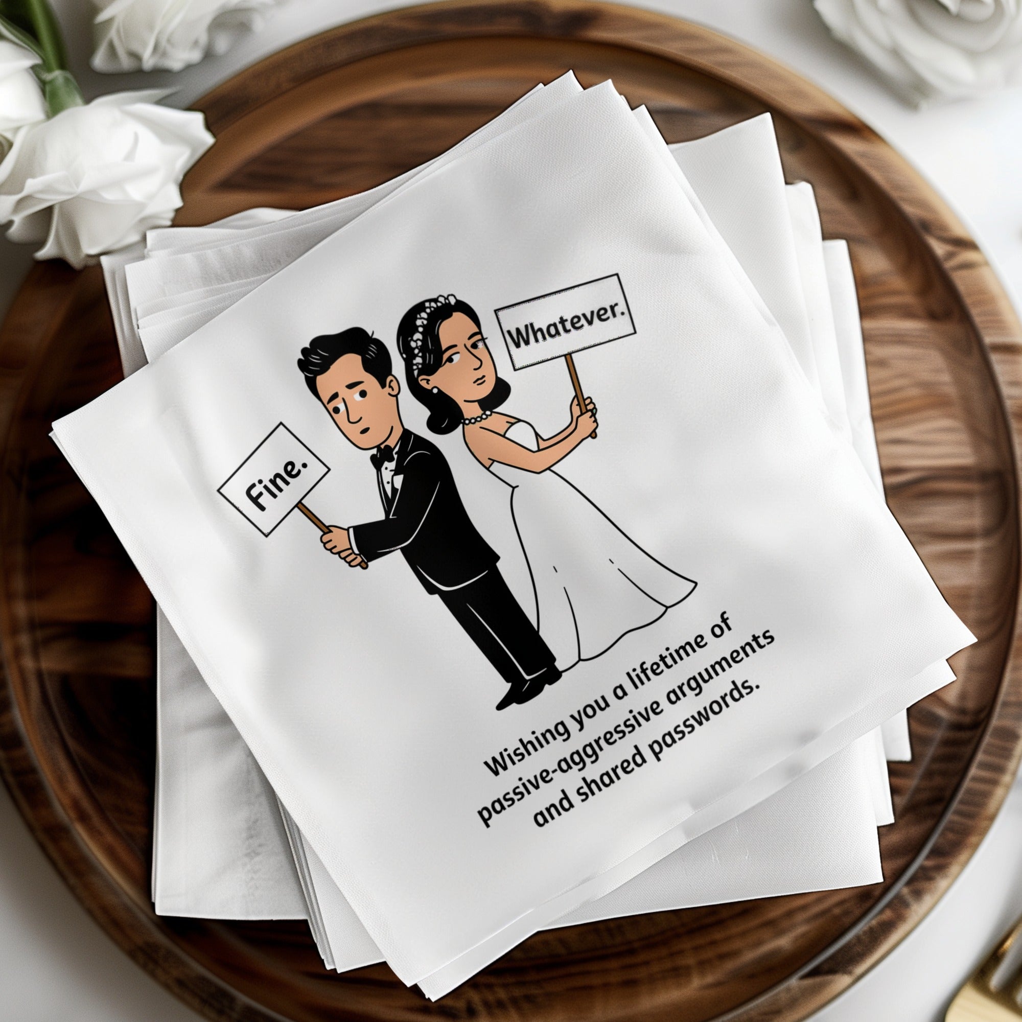 Wedding napkins with a bride and groom holding "Fine." and "Whatever." signs.