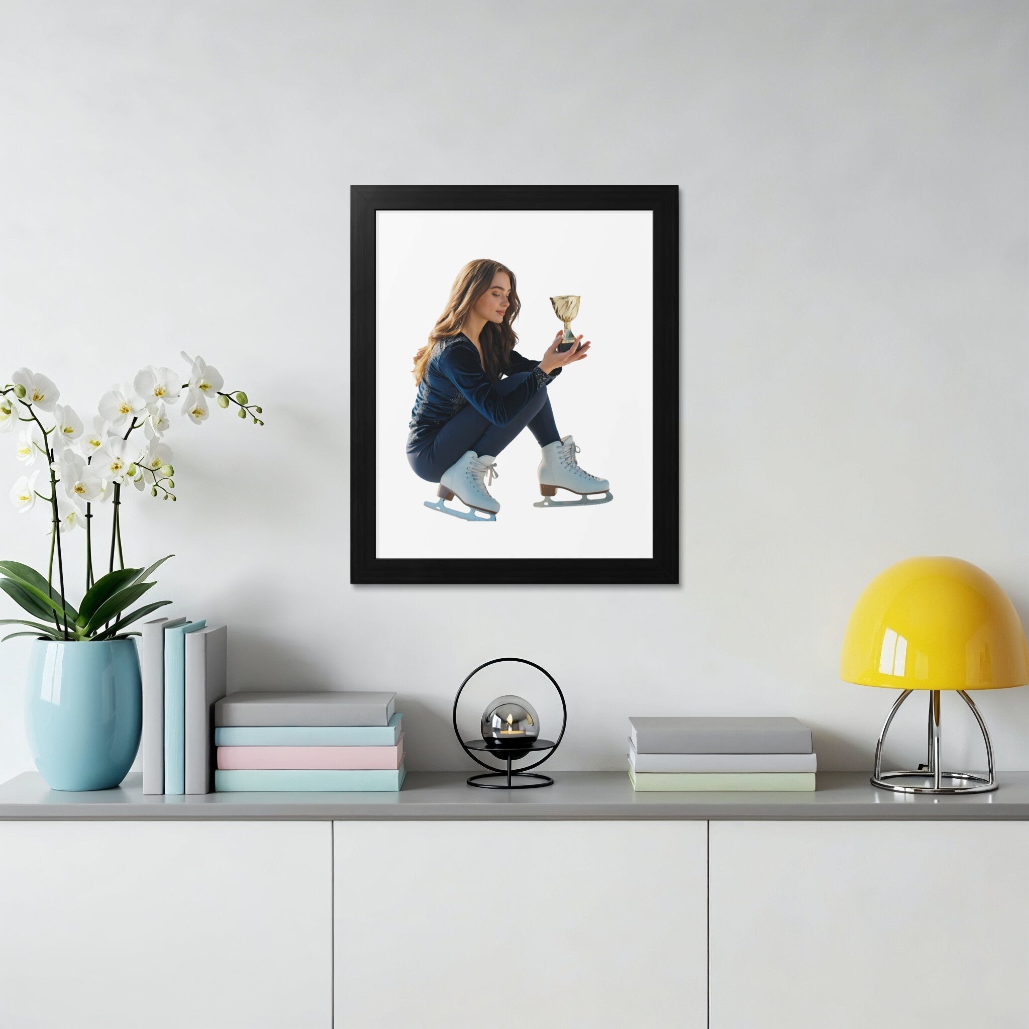 Woman in figure skates holding trophy on shelf with books and lamp.