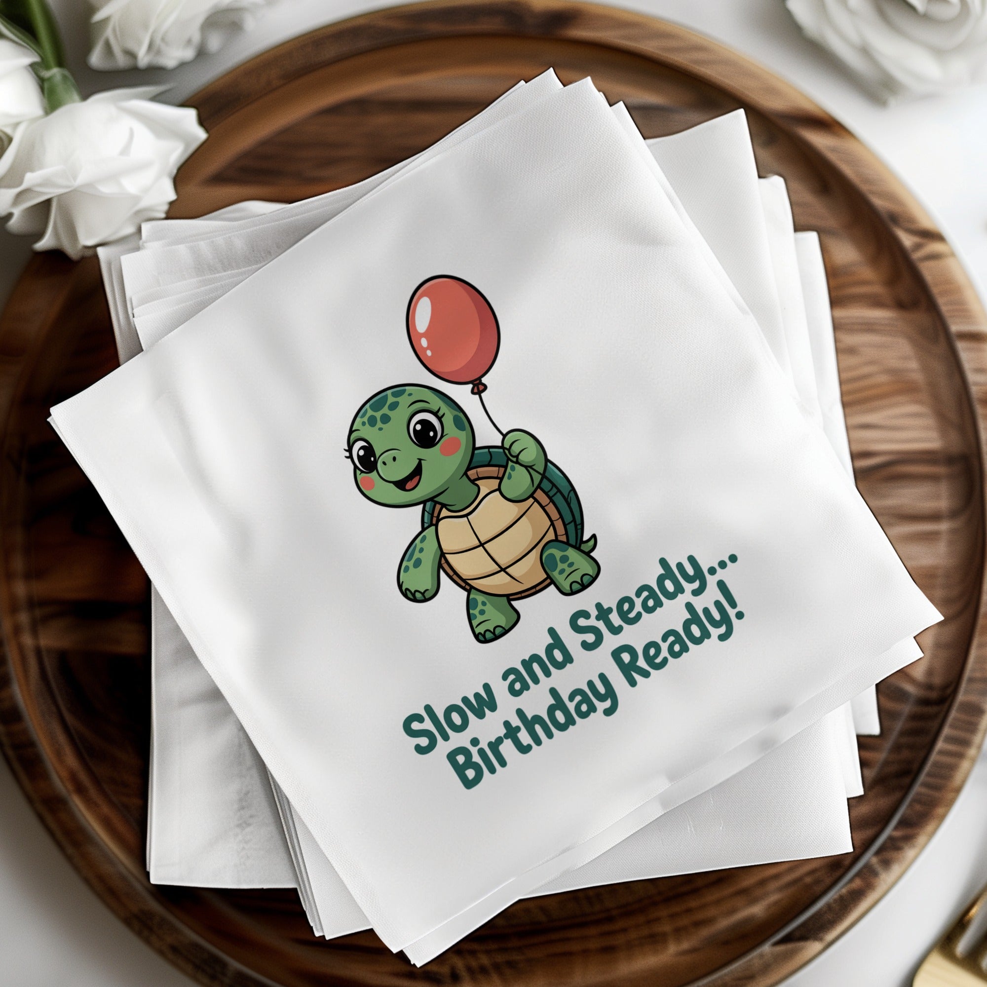 Turtle with balloon on napkins saying "Slow and Steady... Birthday Ready!".