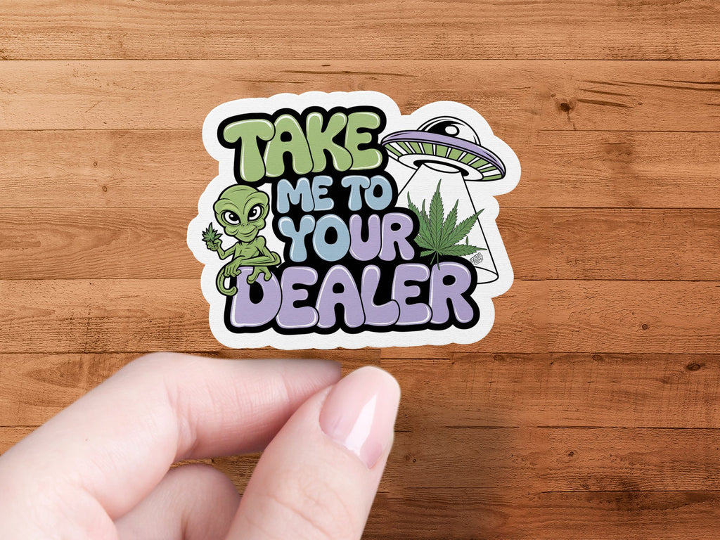Sticker with alien, UFO, and marijuana leaf saying "Take me to your dealer."