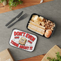 Lunchbox with "Don't Even Think About It" text, contains sandwich, cheese, and nuts.