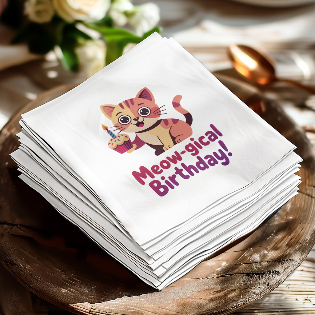 Stack of white napkins featuring a cat with a cupcake and "Meow-gical Birthday!" text.