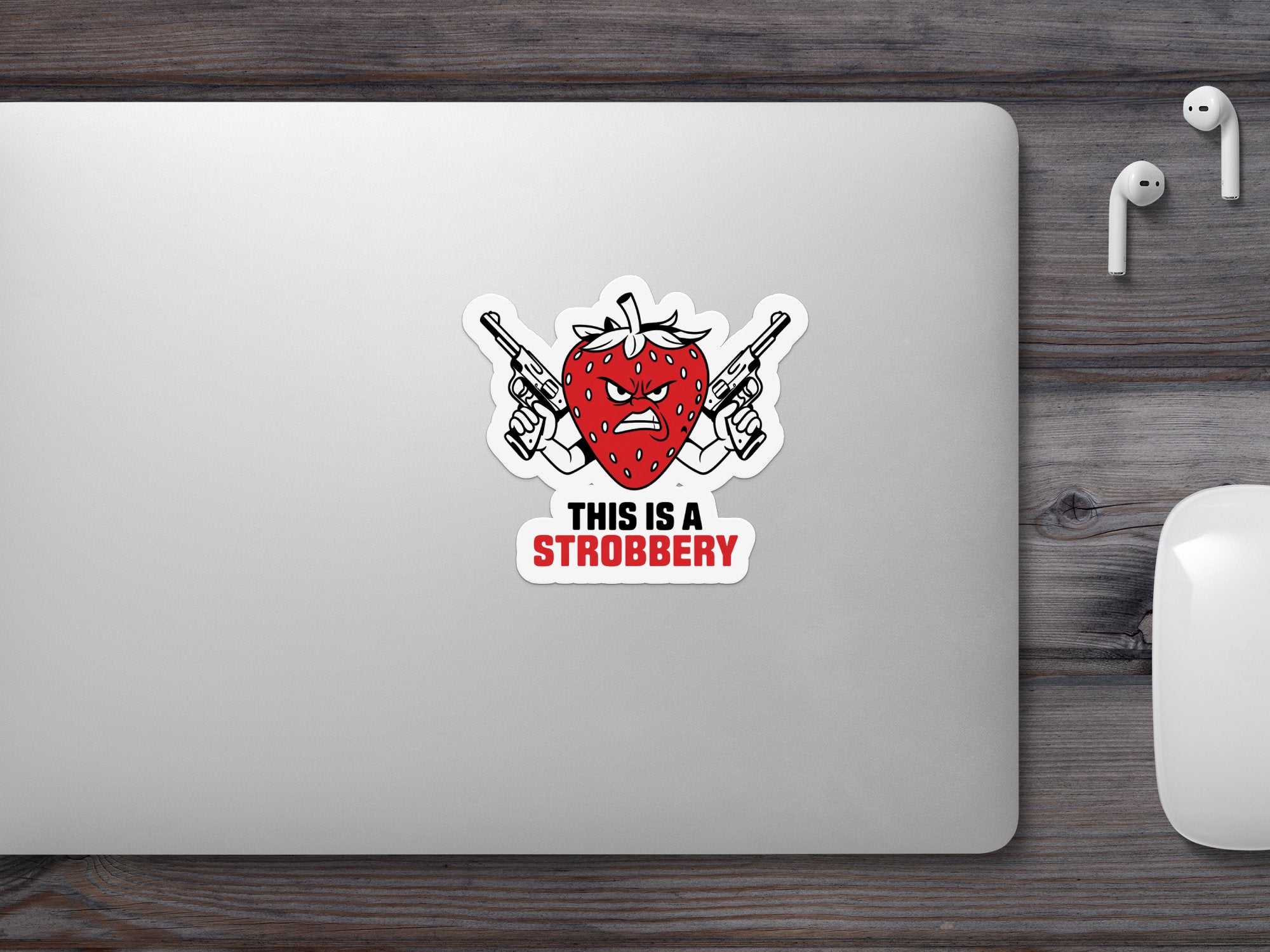 Strawberry with crossed guns and text "THIS IS A STROBBERY".