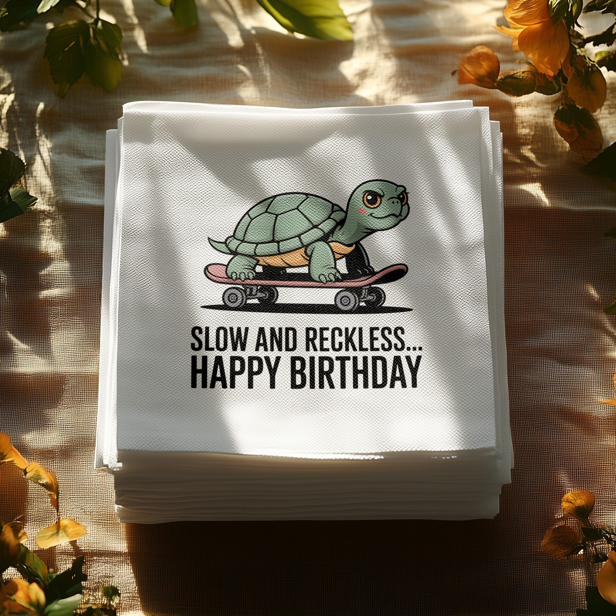 Stack of white napkins with a cartoon turtle on a skateboard and "SLOW AND RECKLESS... HAPPY BIRTHDAY" text.