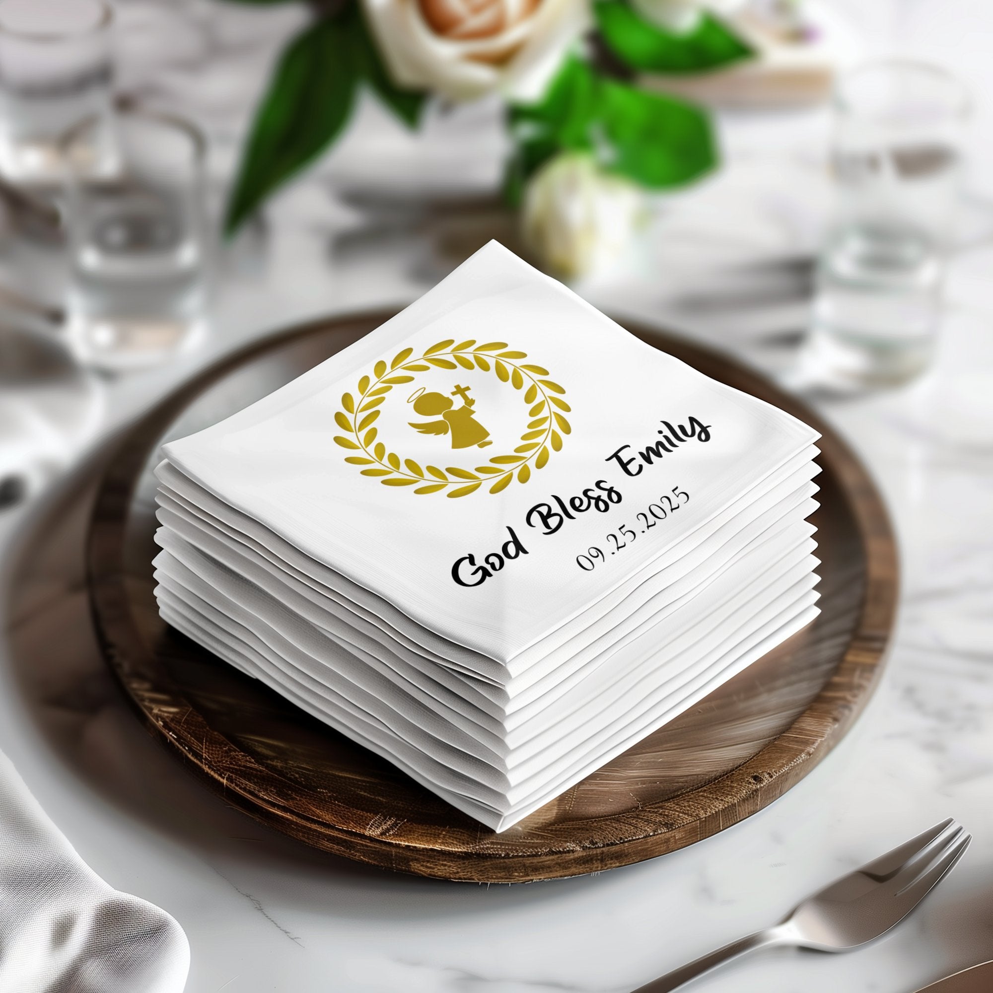 Stack of white napkins with "God Bless Emily" and "09.25.2025" text.
