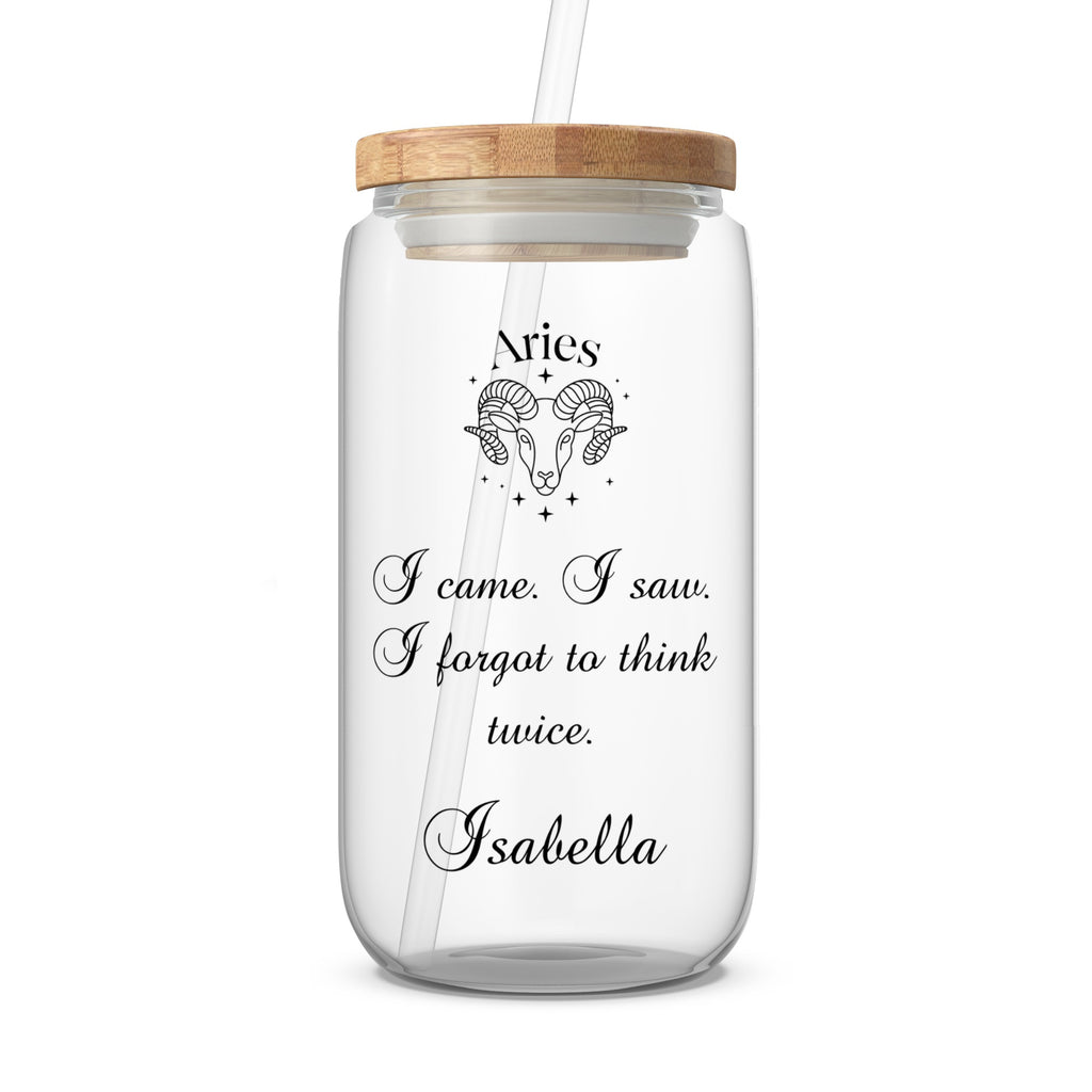 Glass tumbler with Aries zodiac symbol and custom text "Isabella."