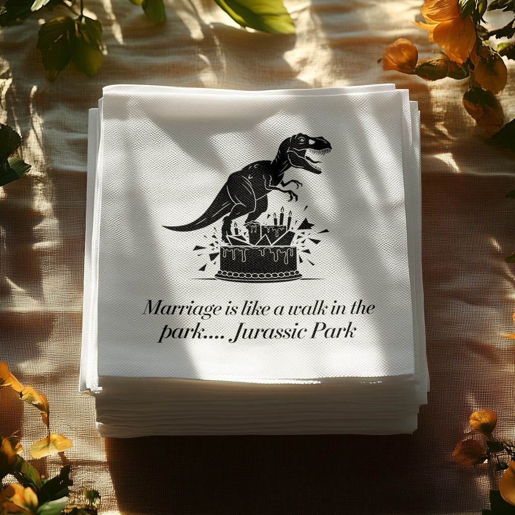 Napkins with a T-Rex graphic and "Marriage is like a walk in the park.... Jurassic Park" text.