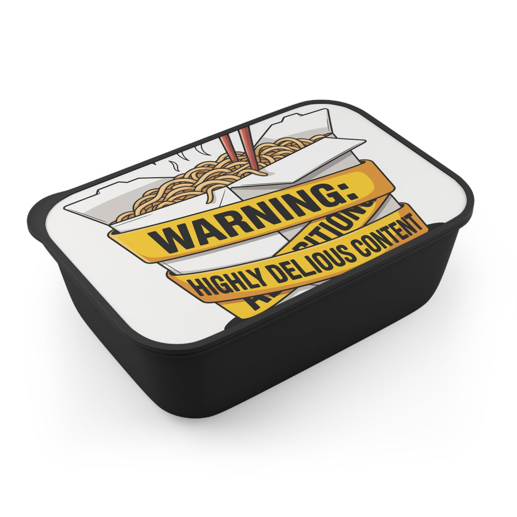 Black lunchbox with noodles, chopsticks, and yellow warning tape.