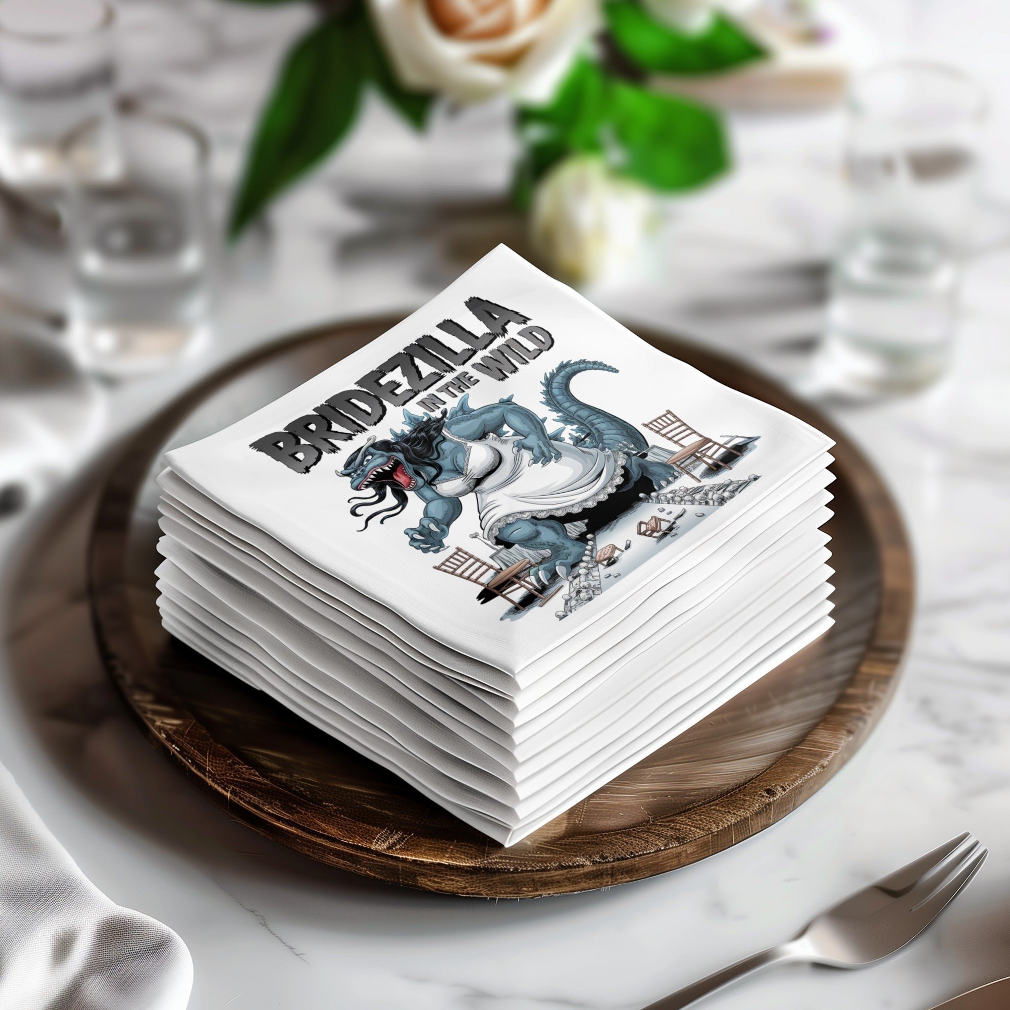 Stack of napkins featuring a Bridezilla illustration with a Godzilla-like monster.