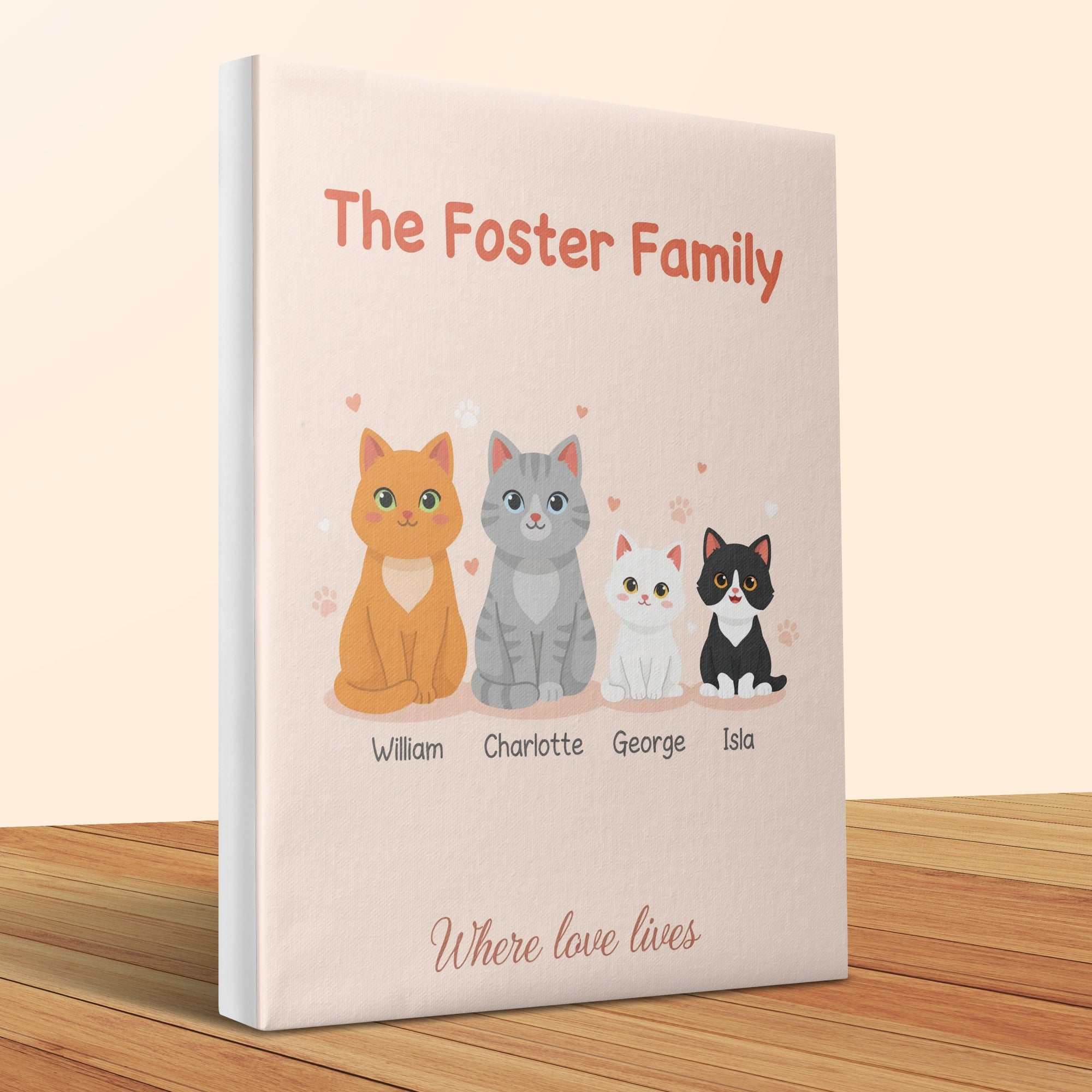 The Foster Family book featuring four personalized cats and "Where love lives" text.