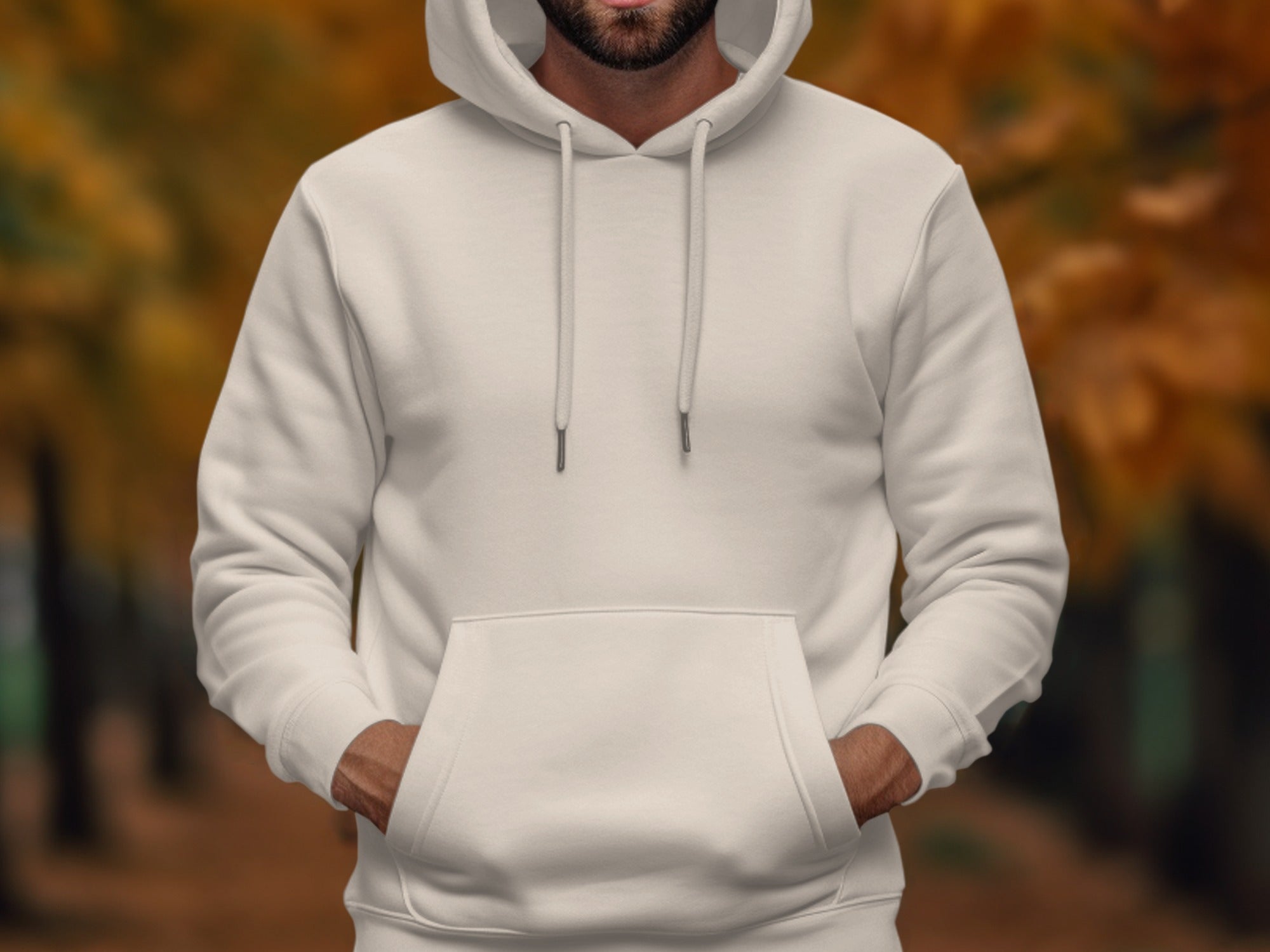 White hooded sweatshirt with a front pocket, worn by a person.