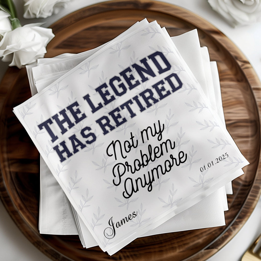 Folded napkins with "THE LEGEND HAS RETIRED" and "Not my Problem Anymore" text.